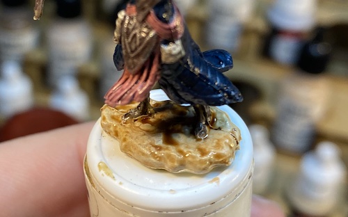 Paint and wash the base